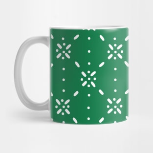 Christmas snowflake on green background Mug